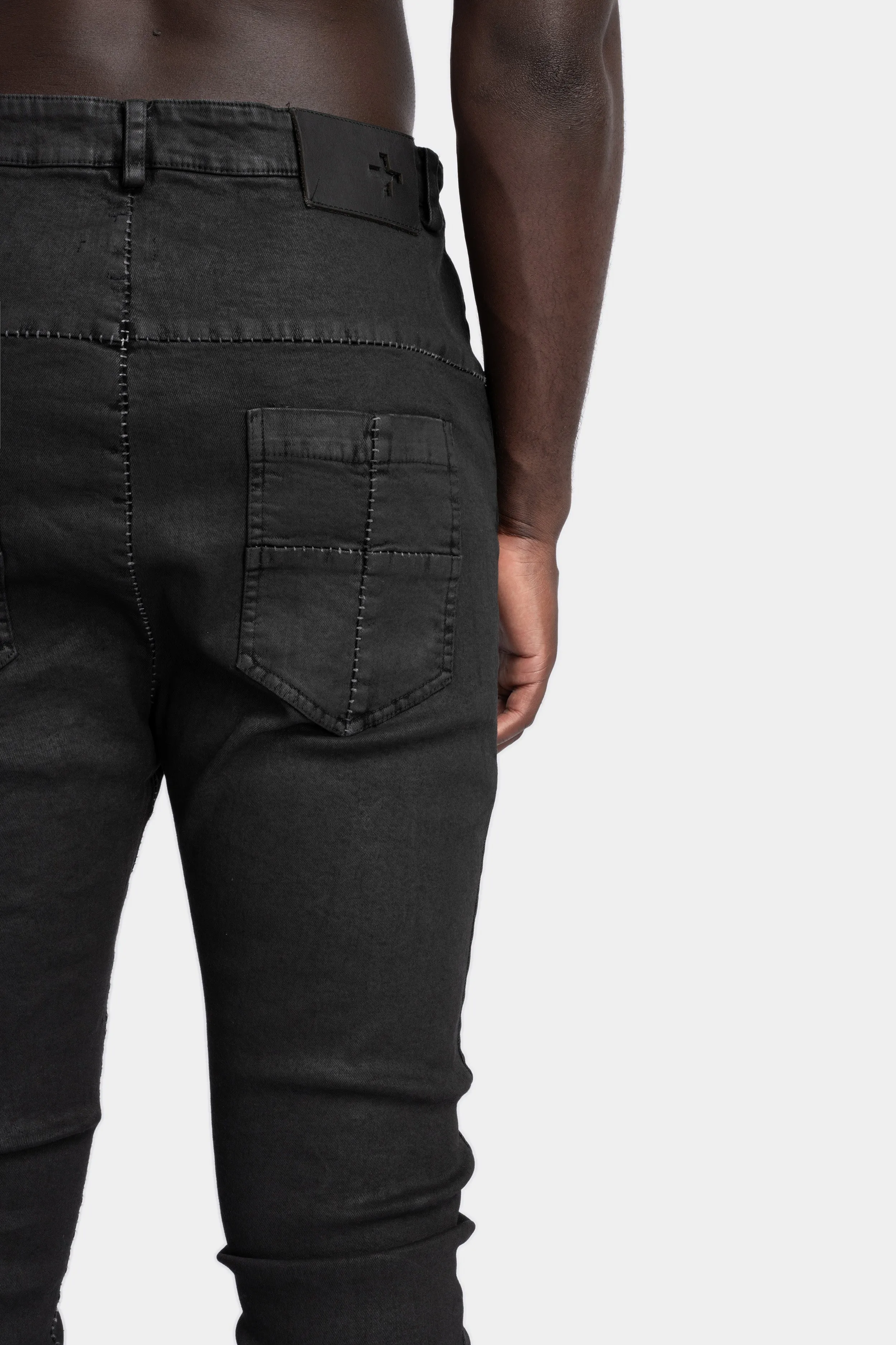 Leather effect coated slim fit jeans