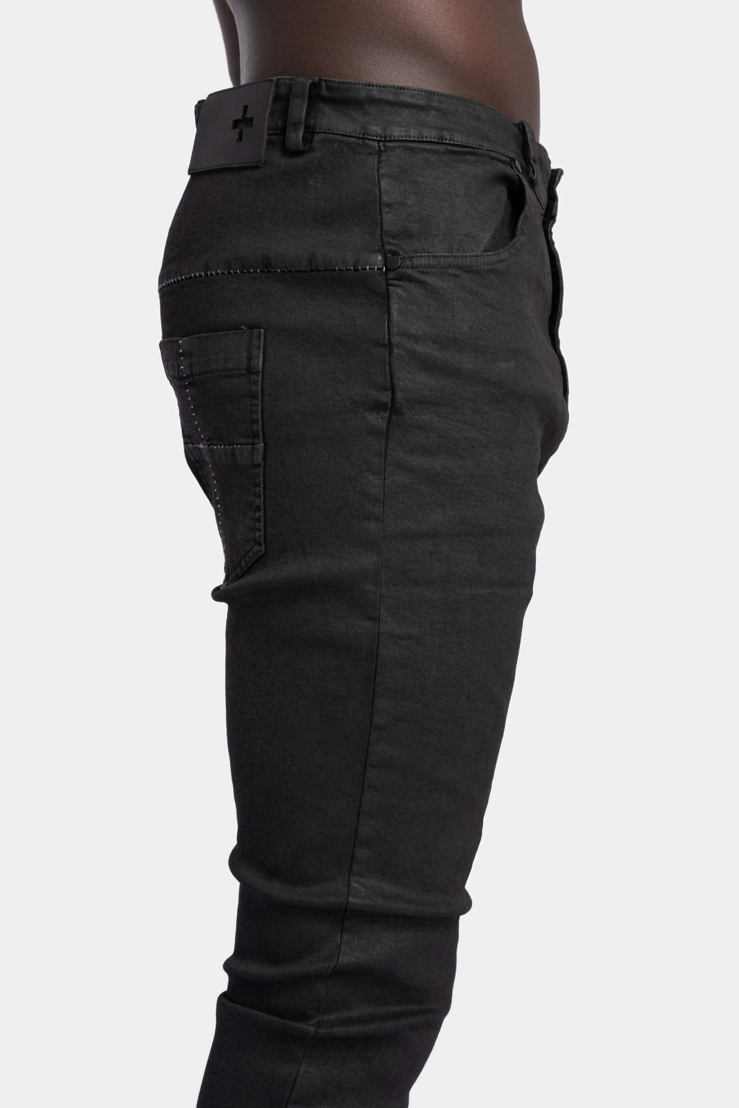 Leather effect coated slim fit jeans
