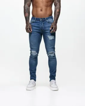 Ripped & Repaired Skinny Jeans - Blue Wash