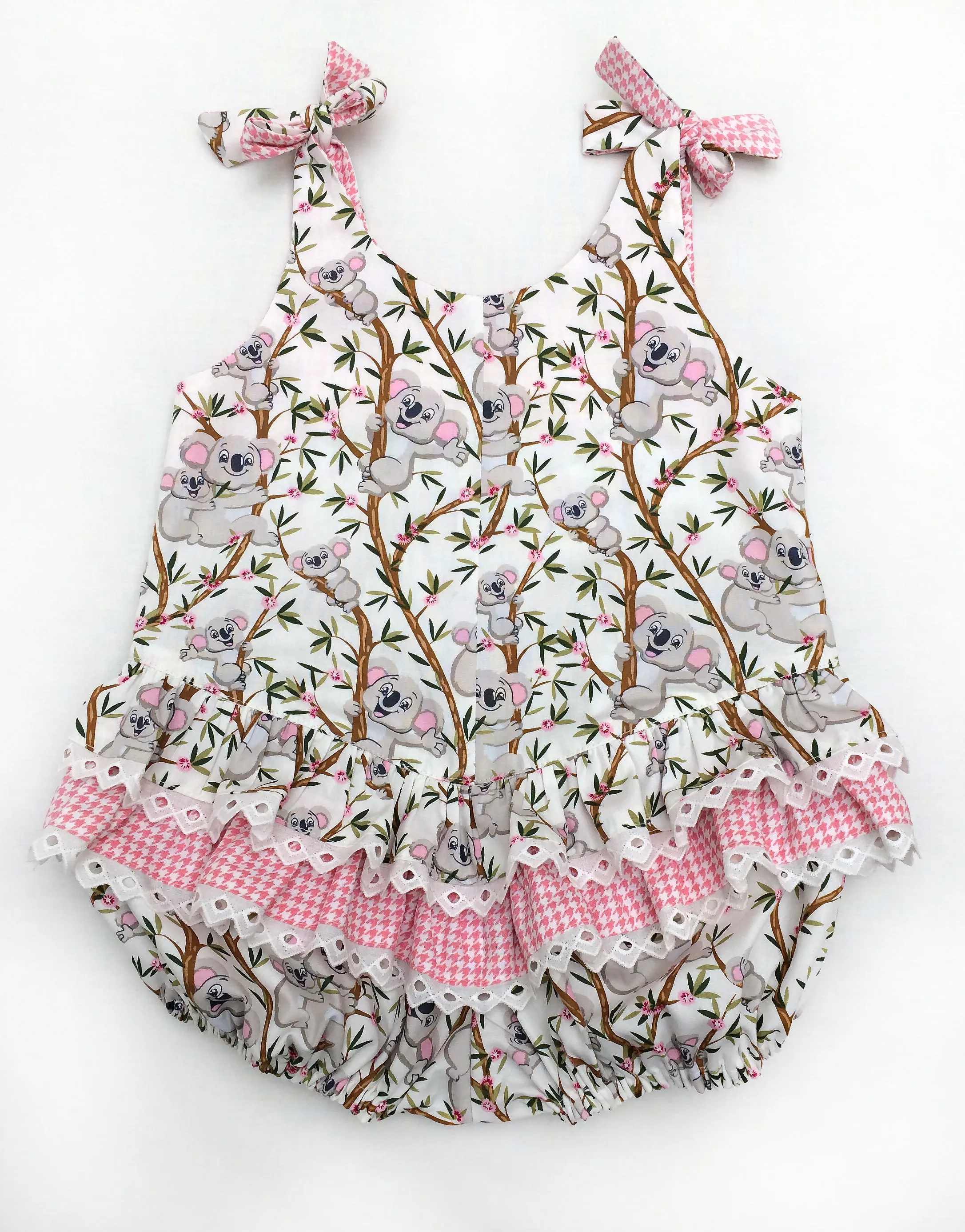 Ruffled baby romper sewing pattern ROSEBUD Romper baby sizes 3 months to 3 years.