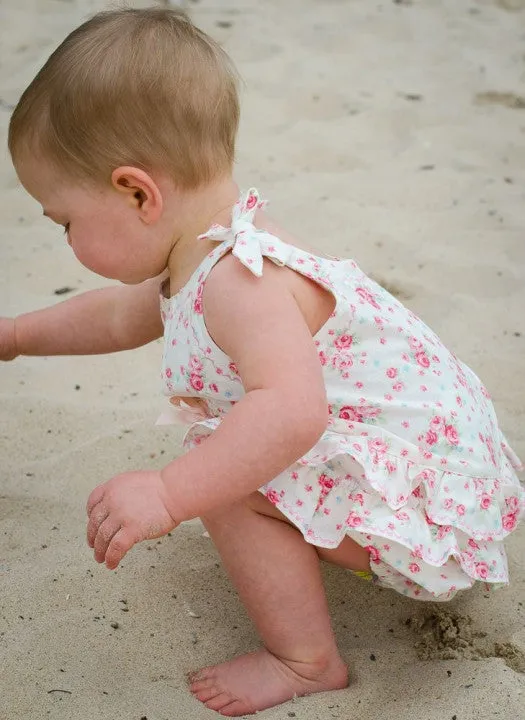 Ruffled baby romper sewing pattern ROSEBUD Romper baby sizes 3 months to 3 years.